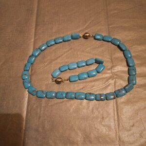 NECKLESS AND HAND BAND BEADS.